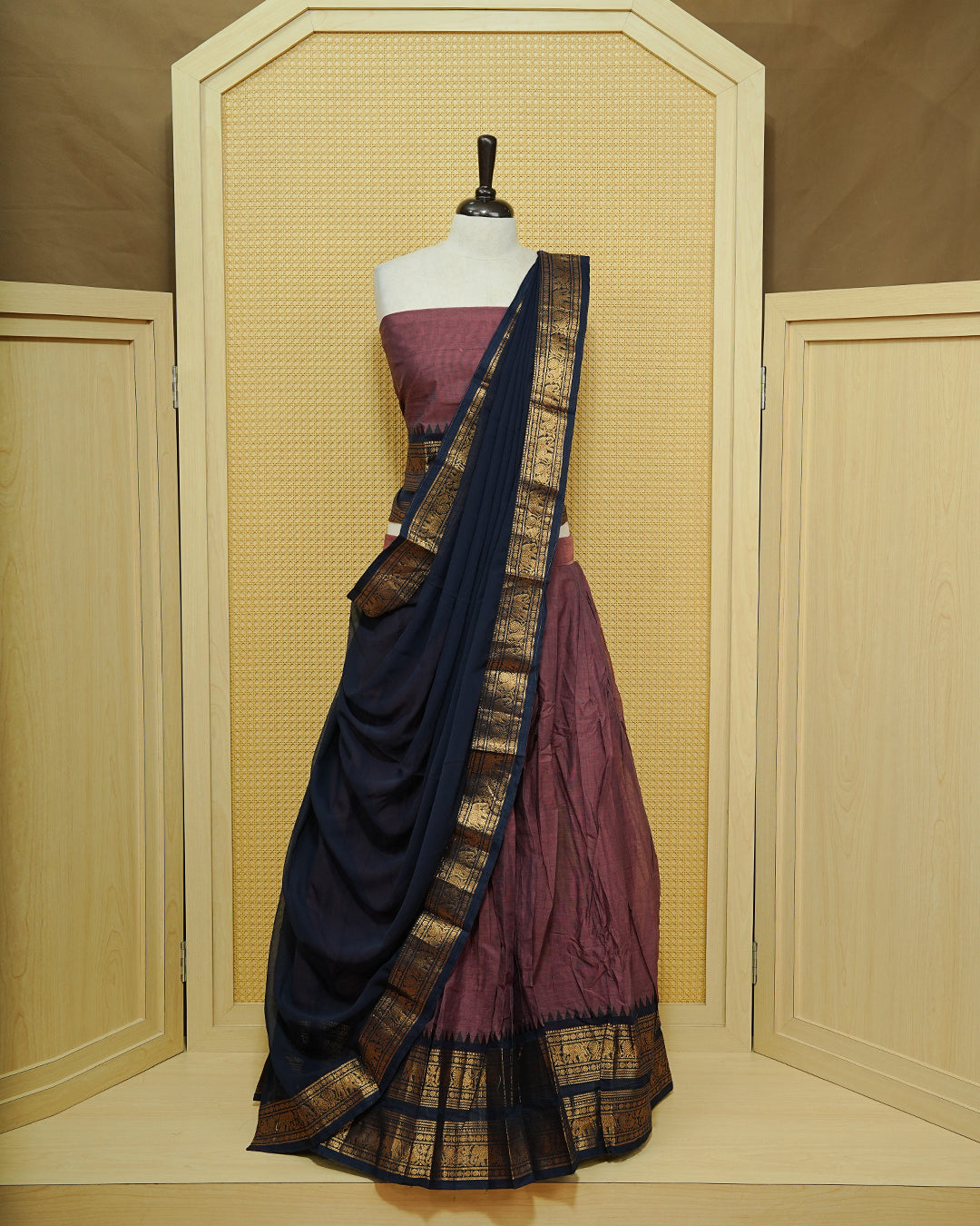 Pinkish grey colour Chettinad Semi Stitched dhavani set Featuring contrast Navy blue with Gold zari border on skirt, Contrast Blouse & matching dupatta.