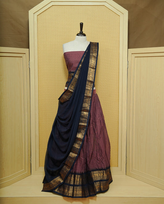 Pinkish grey colour Chettinad Semi Stitched dhavani set Featuring contrast Navy blue with Gold zari border on skirt, Contrast Blouse & matching dupatta.