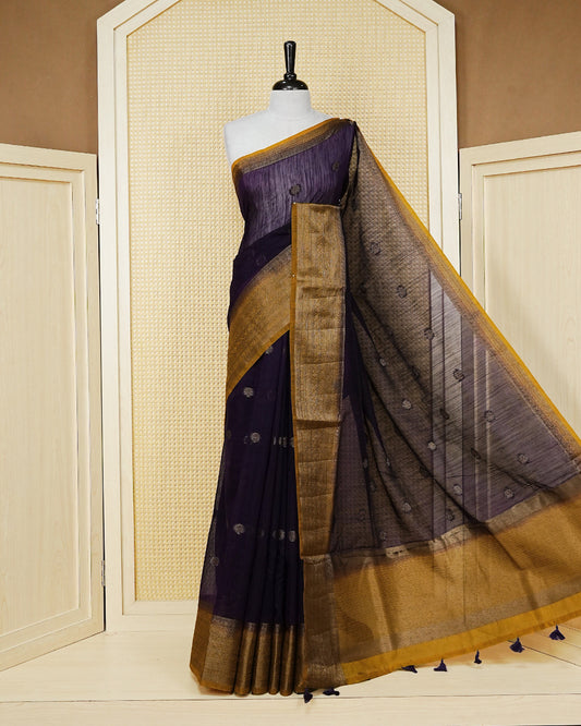 Dark purple colour semi linen saree thread motifs on body, contrast mustard yellow colour gold zari border, rich pallu comes with matching blouse piece