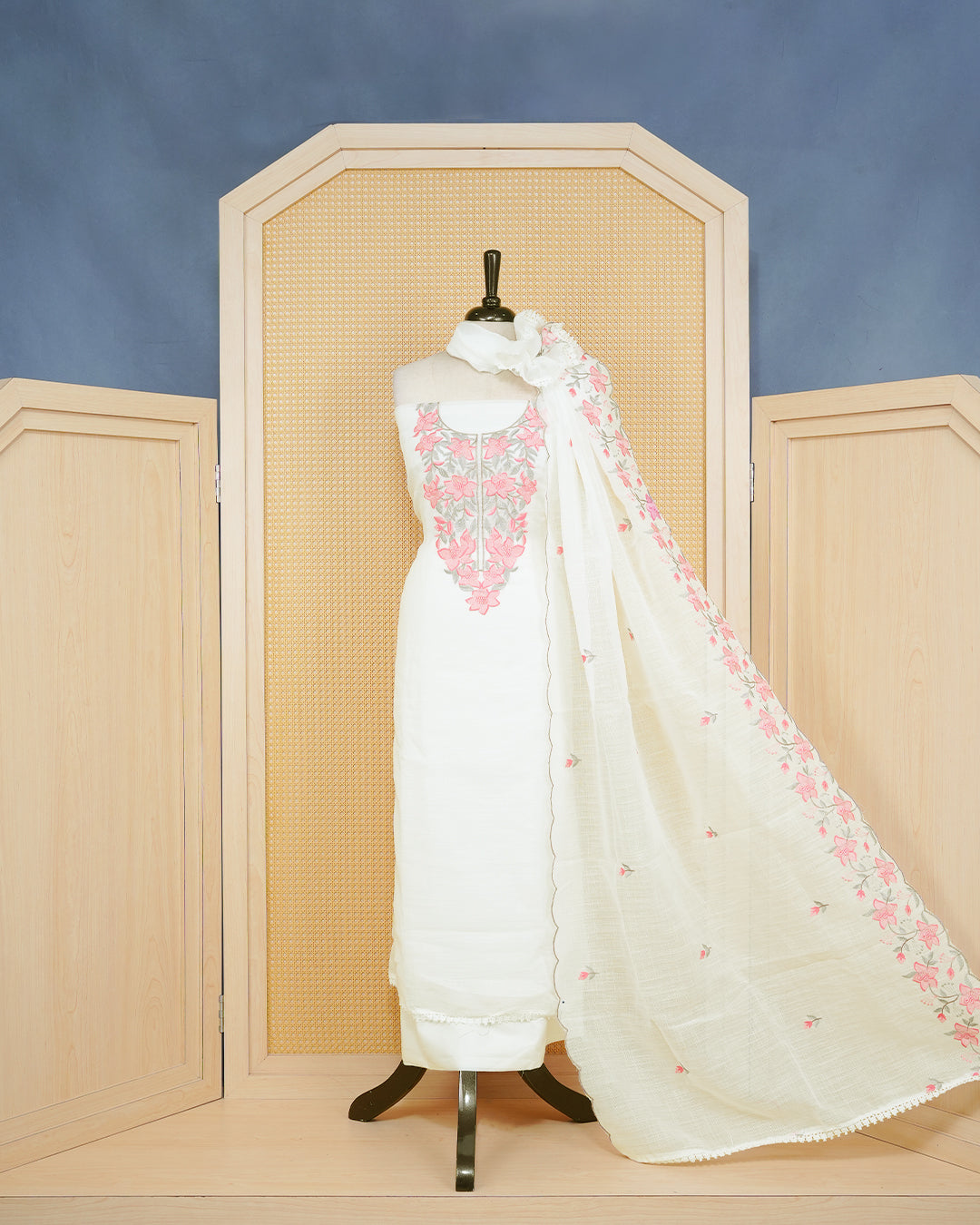White Georgette Salwar Matierial Features an Elegant Floral Embroidary Pattern Aborned With Pink and Gray Thread Work, Pired with matching bottom & elegant Duptta