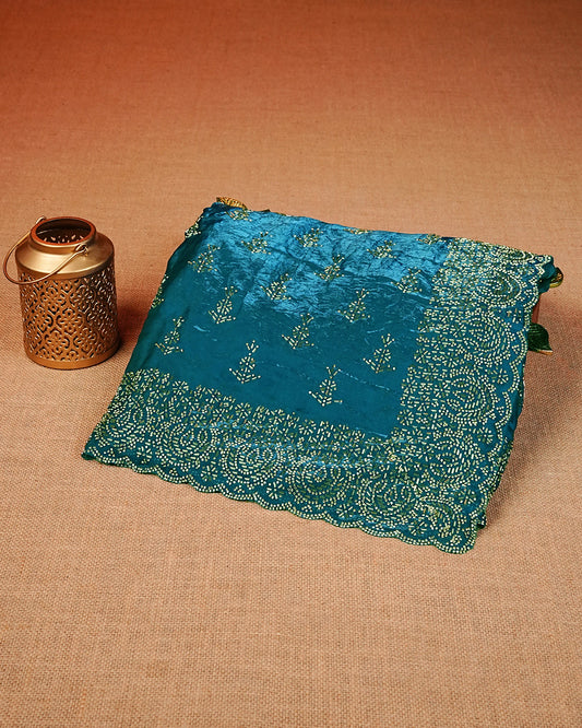 Blue colour Velvet chiffon designer saree featuring Stone & Cut beats work on body,and border, comes with matching blouse piece.