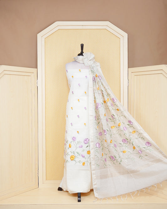 Cream colour tissue salwar material featuring beautiful floral embroidery design with elegant border, paired with matching bottom and beautiful dupatta.