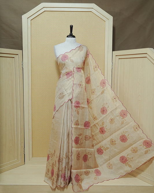 Pink colour Semi tissue saree featuring elegant Rose print with delicate Mirror Work, beautiful Scallop border.