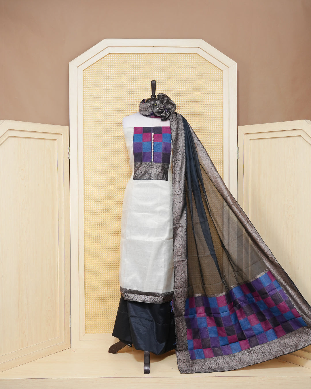 Cream colour Tissue Salwar material featuring Plain Body, multi colour check pattern on chest portion, paired with a matching bottom and an elegant dupatta.