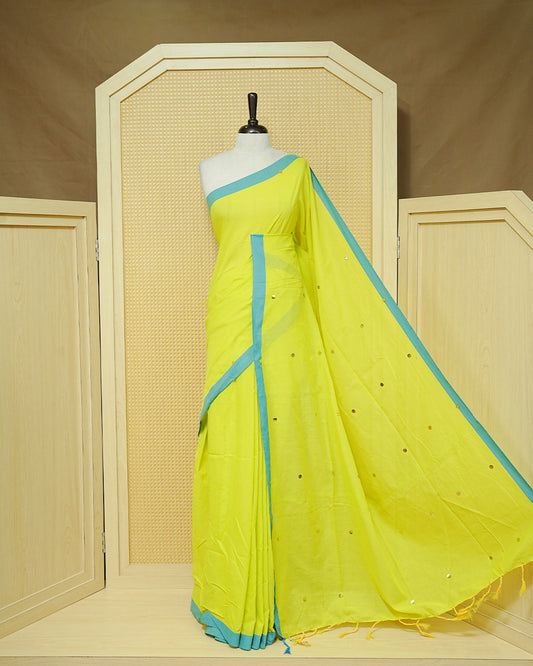 Fluorescence yellow colour Mul cotton saree featuring Gold Sequins, complemented by Contrast Aqua simple Border & tassels.