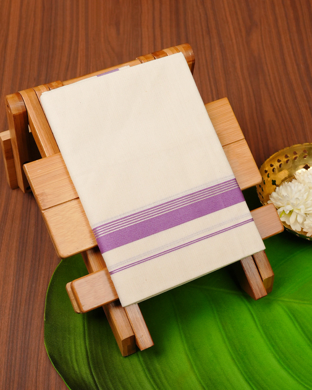 Cream colour cotton Single dhoti featuring Purple with gold border