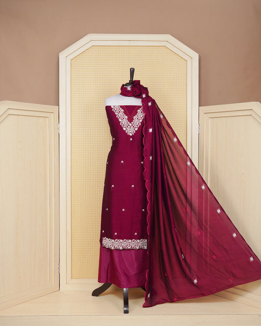 Maroon colour Georgette Salwar material featuring an Floral Threadwork on Body, paired with a matching bottom and an elegant dupatta.