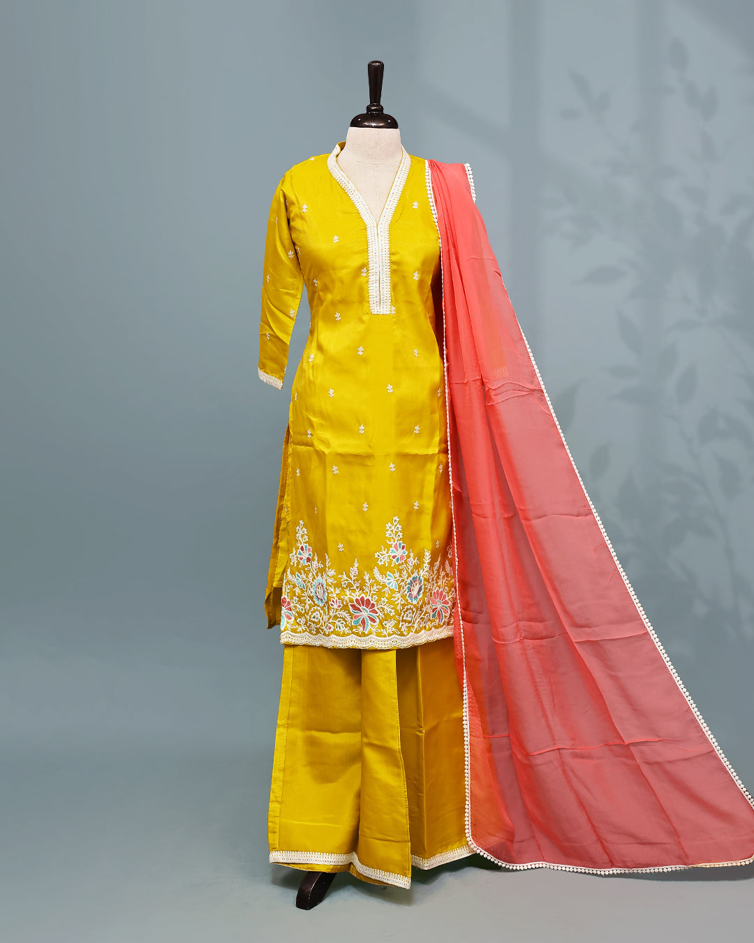 Yellow colour Salwar set comes top with Thread & Sequins work on body, paired with matching bottom and contrast dupatta.