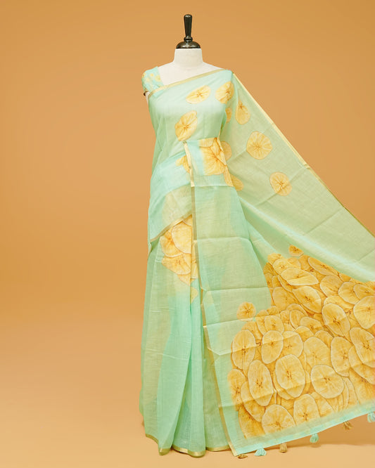 Aqua Green Colour Semi Linen Saree featuring Chips prints, paired with matching printed blouse piece.