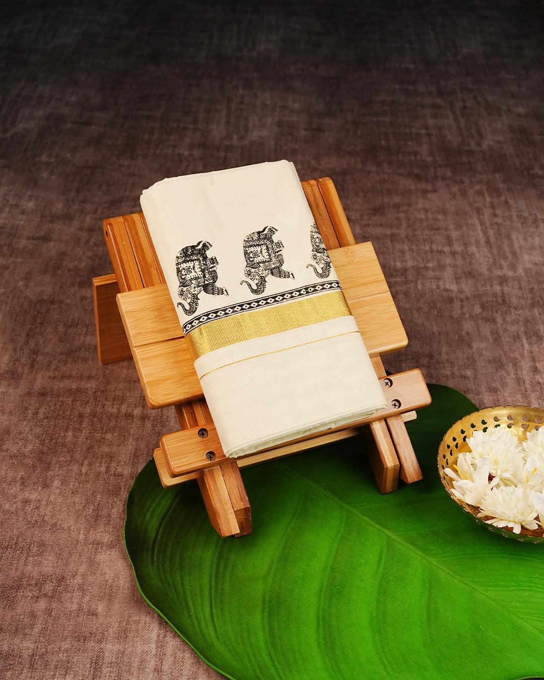 Cream Coloured Cotton Double Dhoti Finished with Black Colour Elephant Printed Gold Kara