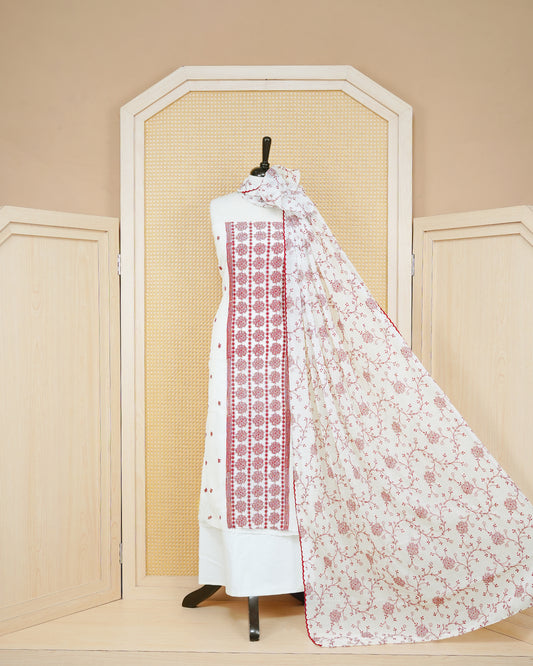 White colour Georgette Salwar material Featuring Gold zari floral motifs on body, paired with matching bottom & Elegant Dupatta