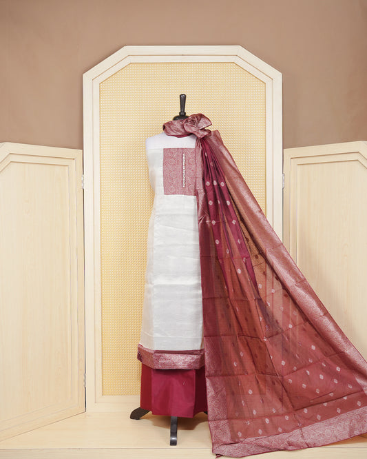 Cream colour salwar material featuring Plain Body Design without border, Maroon colour work on neck portion, paired with matching bottom and elegant dupatta.