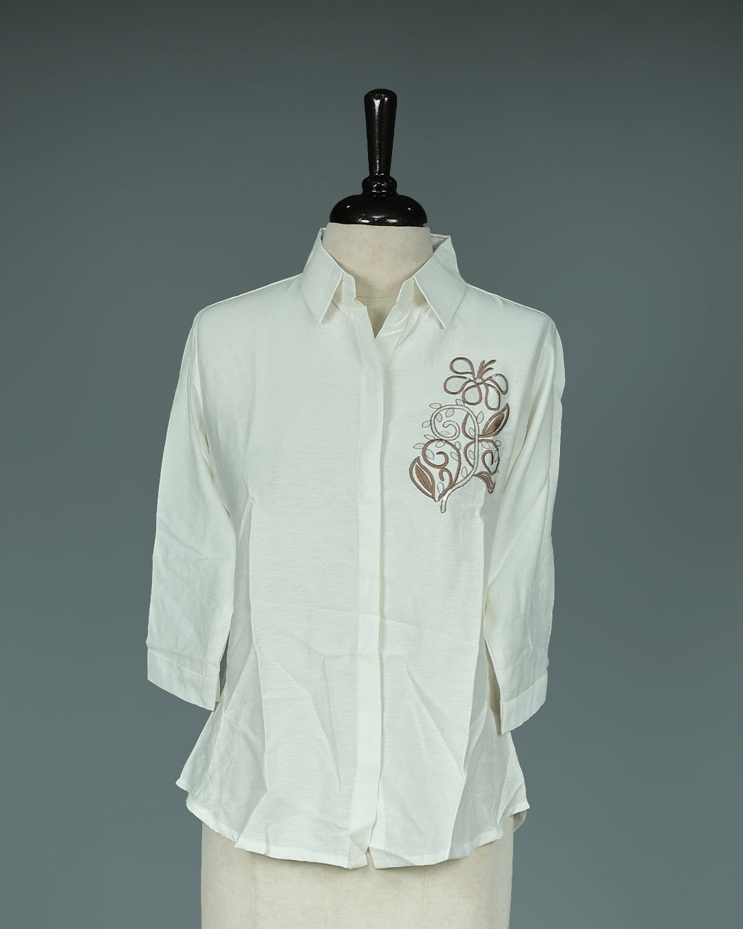 Cream colour Top with Thread Print work on body, collar design, With sleeve.