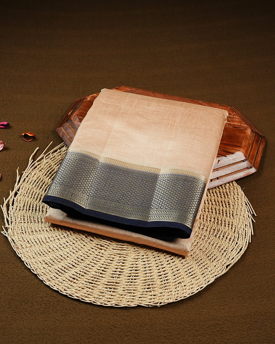 Cream colour Tussar silk saree Featuring Elegant Plain body, complemented by Contrast Navy blue colour with gold zari border, paired with matching blouse piece.