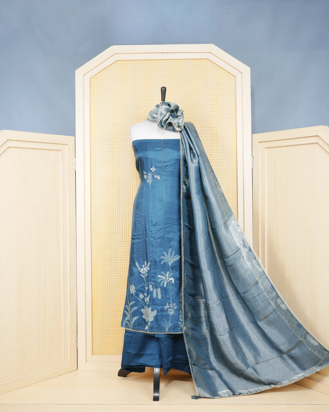 Steel Blue Silk Salwar Material Features an Elegent Floral Embroidary Pattern Aborned With Shimmering Metallic Gold Thread and Lace Border Work, paired with matching bottom & elegant Duptta