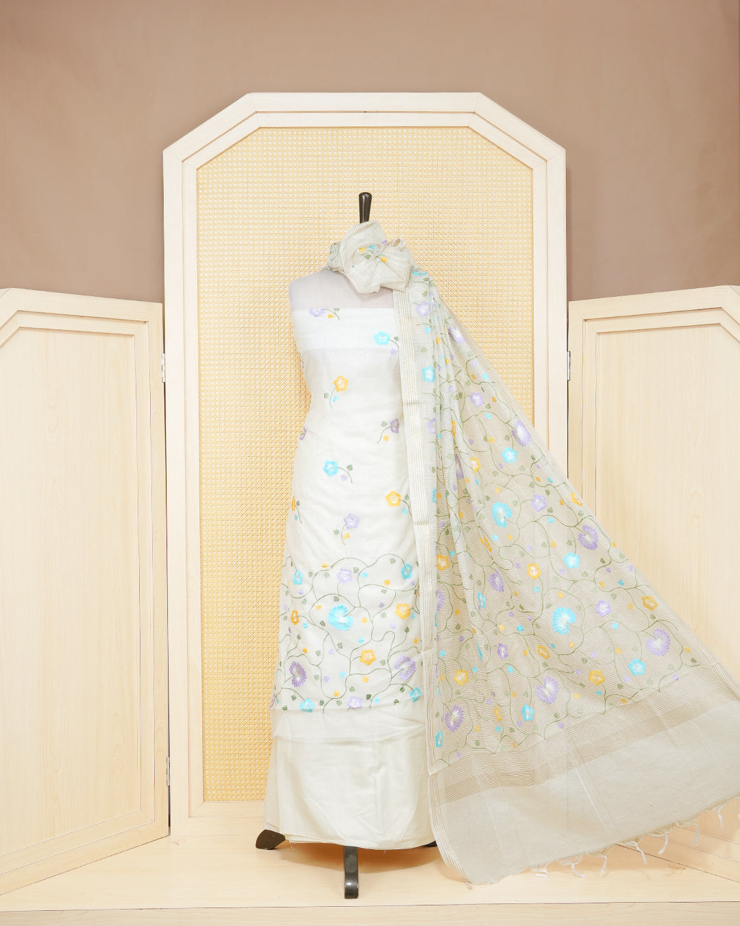 Cream colour tissue salwar material featuring an elegant floral Thread Work on Body , paired with a matching bottom and an elegant dupatta.