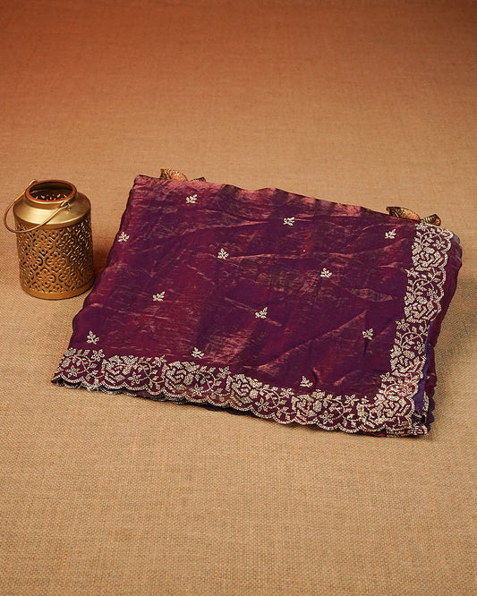 Redish purple colour Velvet chiffon designer saree featuring delicate stone motifs on body and stone worked border, comes with matching blouse piece.