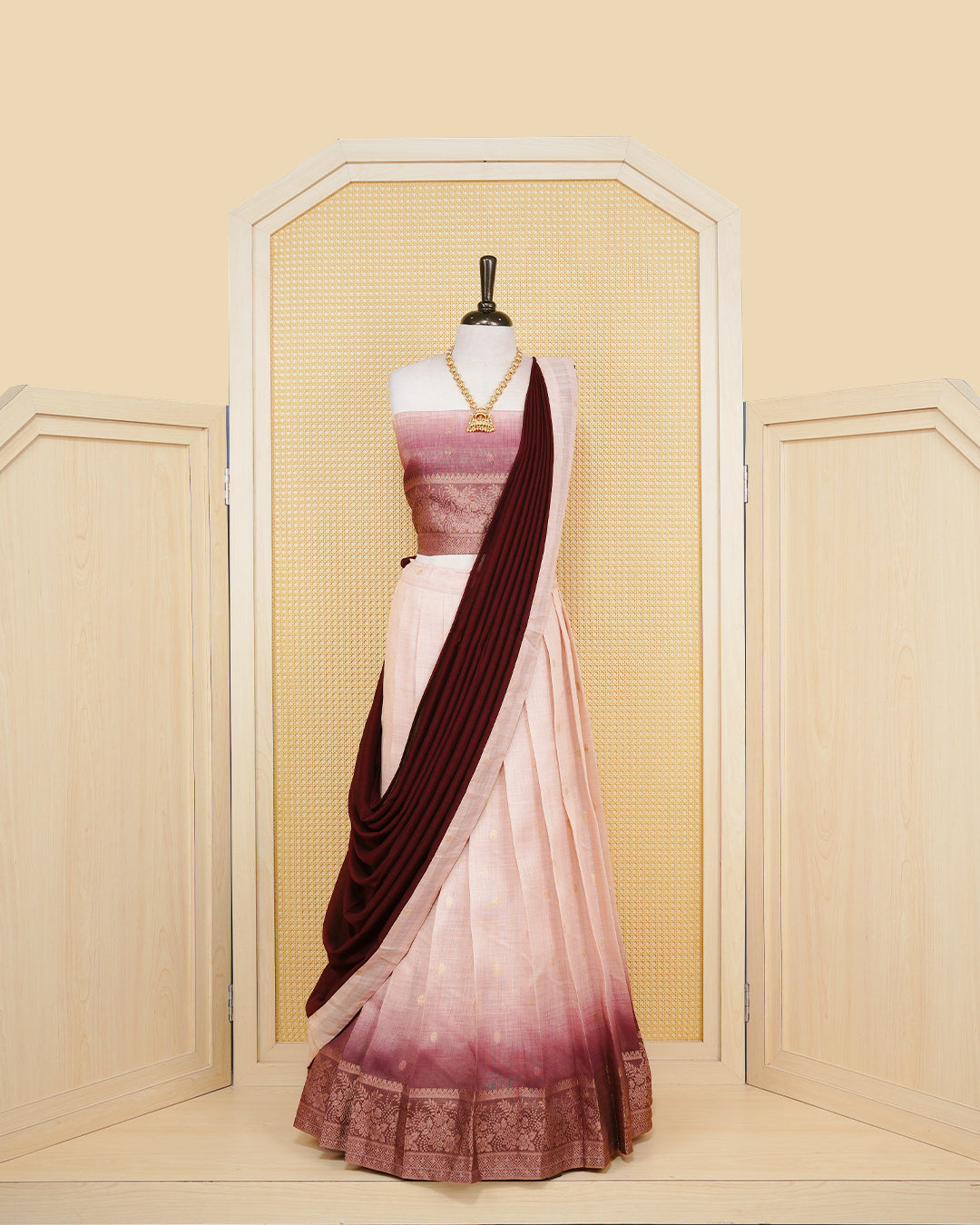 Cream ombre & burgundy colour Linen Silk Semi stitched dhavani set featuring buttas, zari bordered skirt & blouse piece and dupatta.