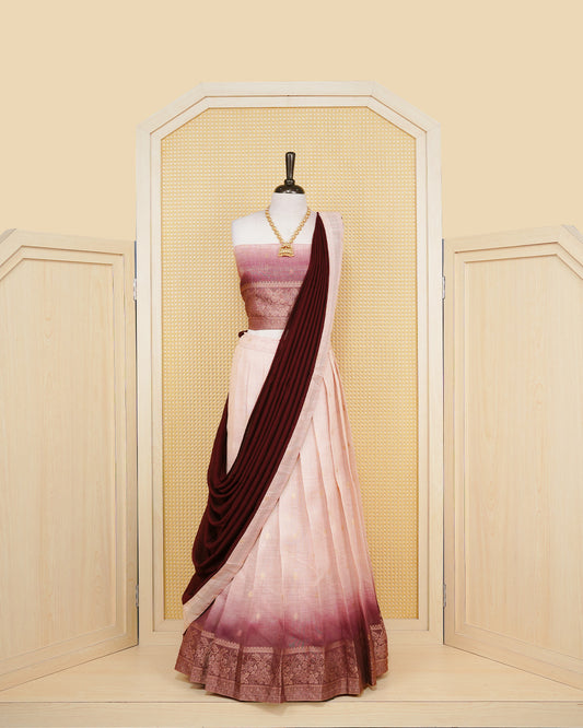 Cream ombre & burgundy colour Linen Silk Semi stitched dhavani set featuring buttas, zari bordered skirt & blouse piece and dupatta.