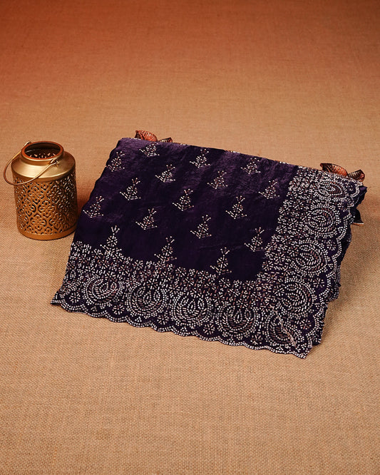 Purple colour Velvet chiffon designer saree featuring Stone & Cut beats work on body,and border, comes with matching blouse piece.