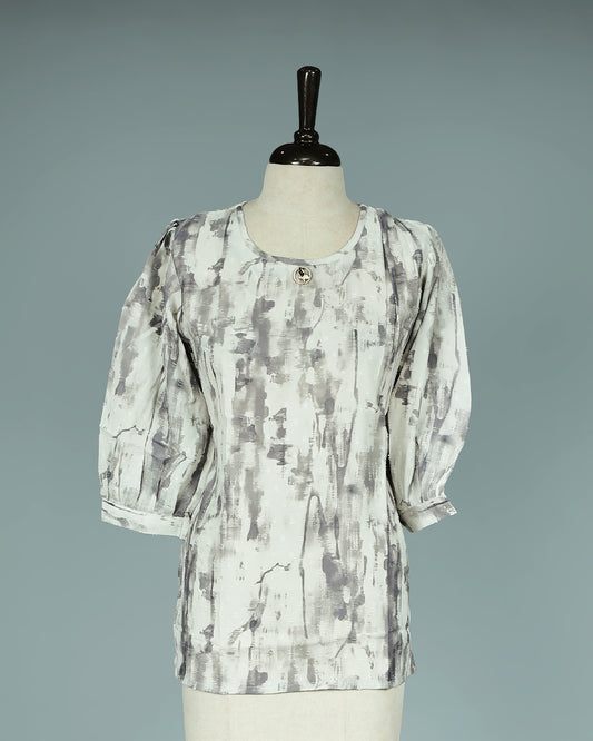 Light brown colour Top with Print on body, Round neck design, With sleeve.