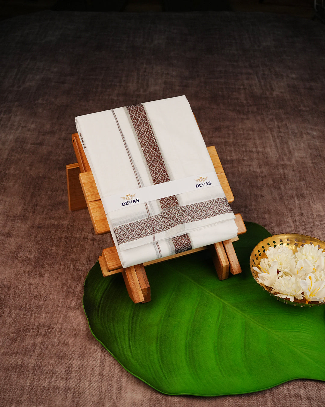 Off White Colour Cotton Double Dhoti Finished With A Brown Designed Pattern On Silver kara.