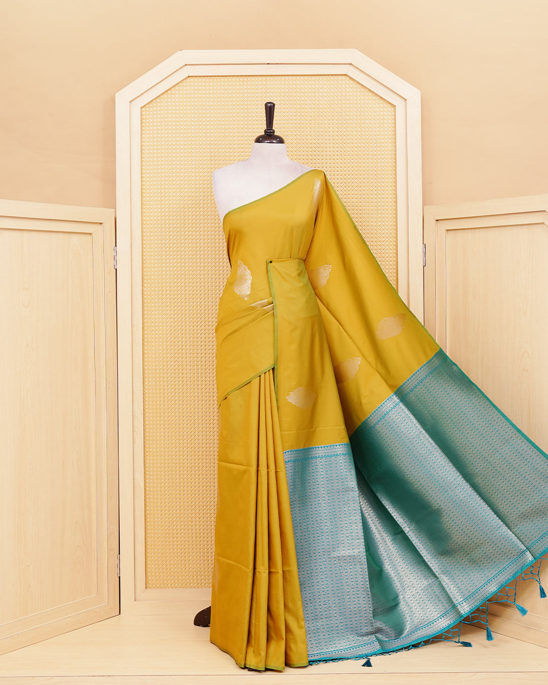 Mehandi colour semi silk saree.