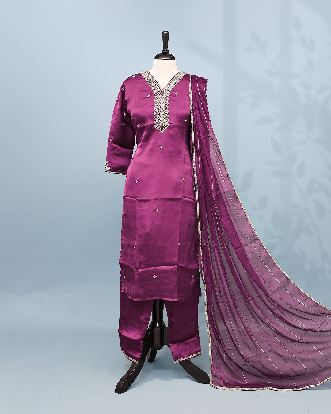 Purple colour Salwar set comes top with Stone work on body, paired with matching bottom and dupatta.