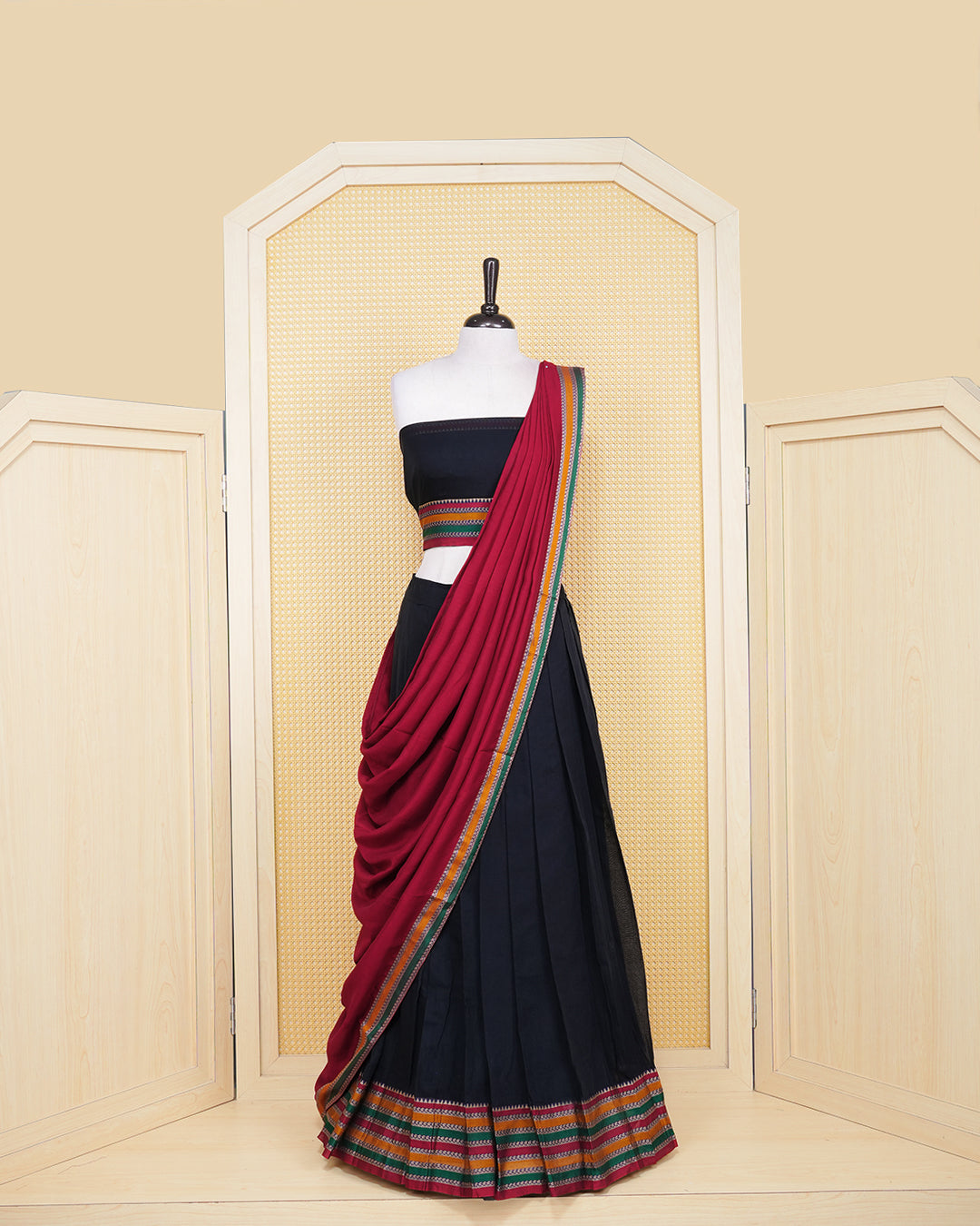 Black colour Chettinad Semi Stitched dhavani set Featuring multicolour with zari on skirt, matching Blouse & Contrast dupatta.