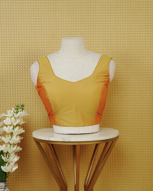 Mustard Yellow colour Sleeveless Blouse Featuring A Stylish Sweetheart Neck, Smooth Finish, And A Comfortable Tailored Fit.