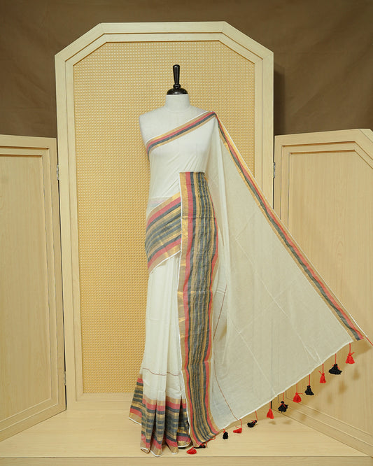 Off-White Mul Cotton Saree featuring a plain body with a multicolour striped zari border in shades of Red, Black, and gold & red and black tassels