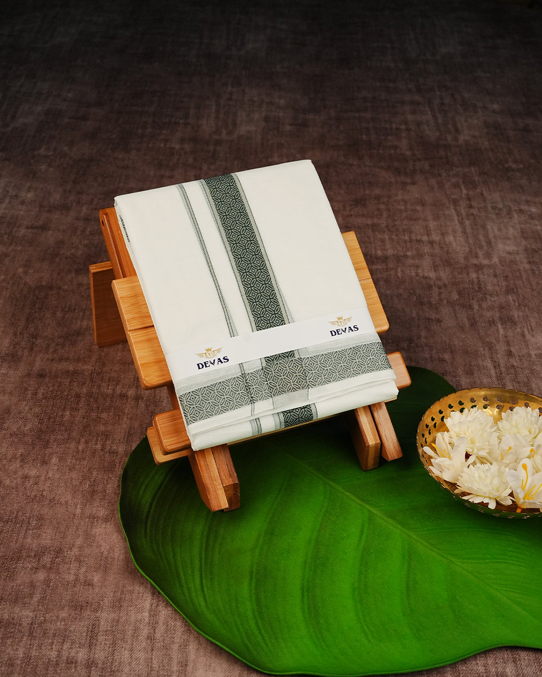 Off White Colour Cotton Double Dhoti Finished With A Green Designed Pattern On Silver kara.