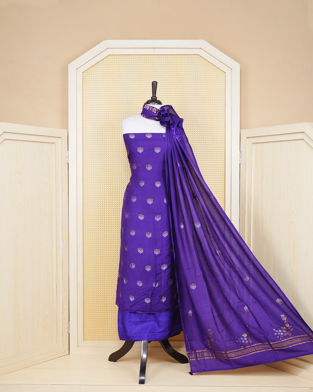 Deep purple colour Georgette Salwar material Featuring Gold & silvar zari floral motifs on body, paired with matching bottom & Elegant Dupatta