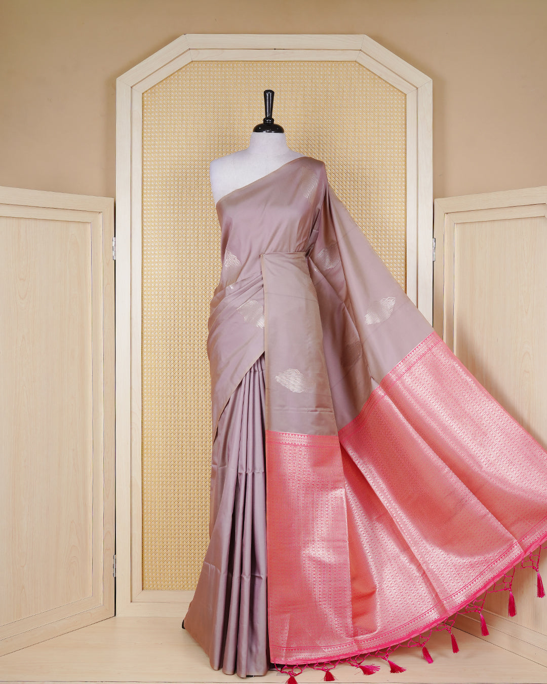 Greyish Cream colour semi silk saree.