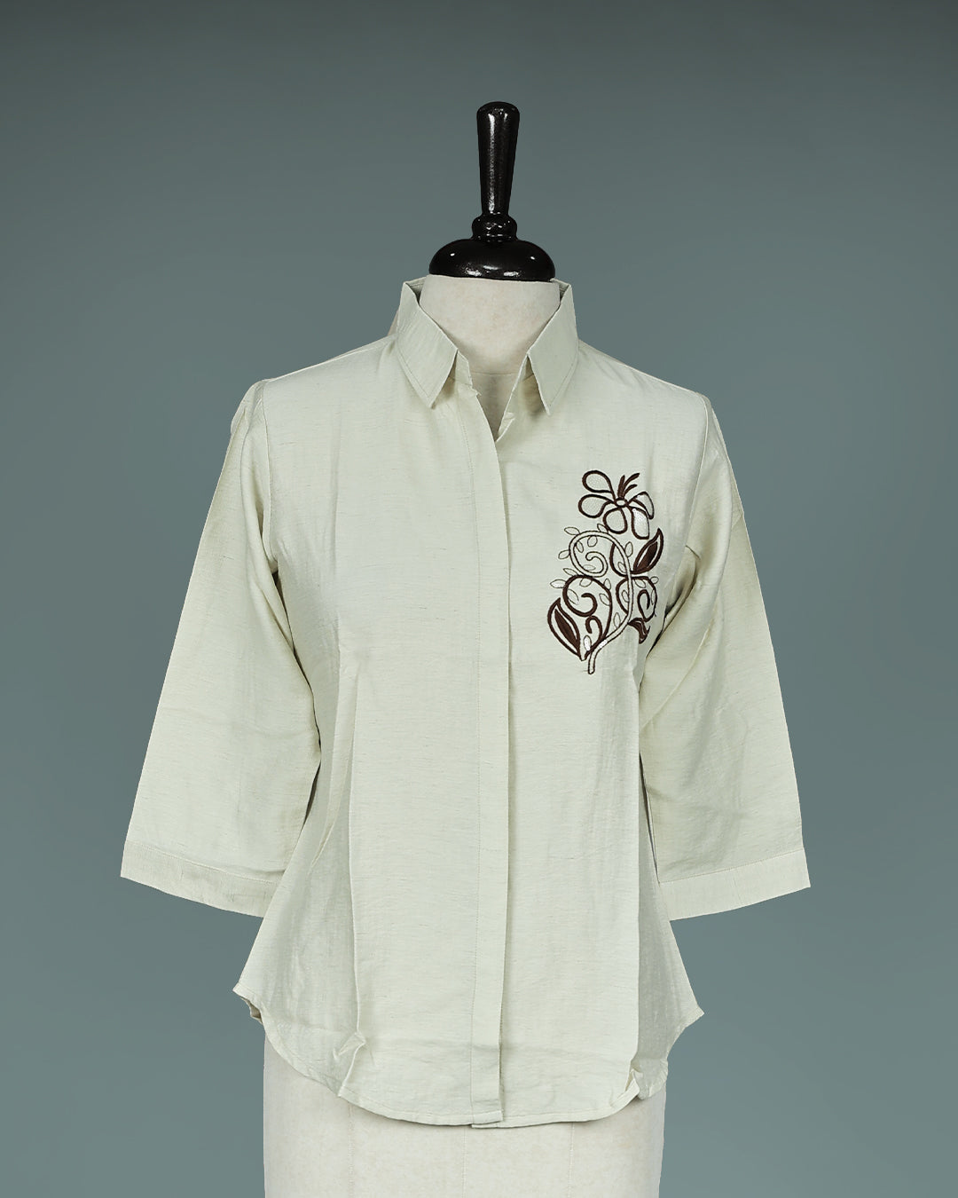 Cream colour Top with Thread work on body, collar design, With sleeve.