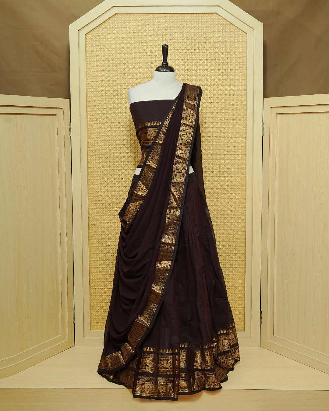 Chocoalte colour Chettinad Semi Stitched dhavani set Featuring Self colour with Gold zari border on skirt, Matching Blouse & dupatta.