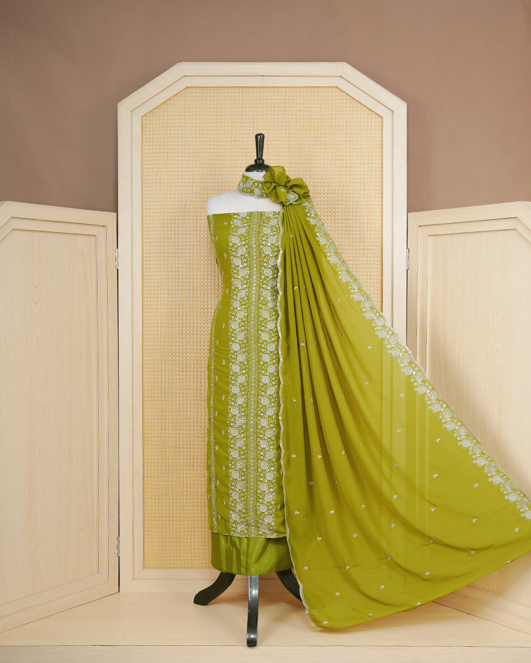 Avocado Green colour Georgette Salwar Material Featuring Gold Thread Mirorr Work on body, paired with matching Bottom & Elegant Dupatta.