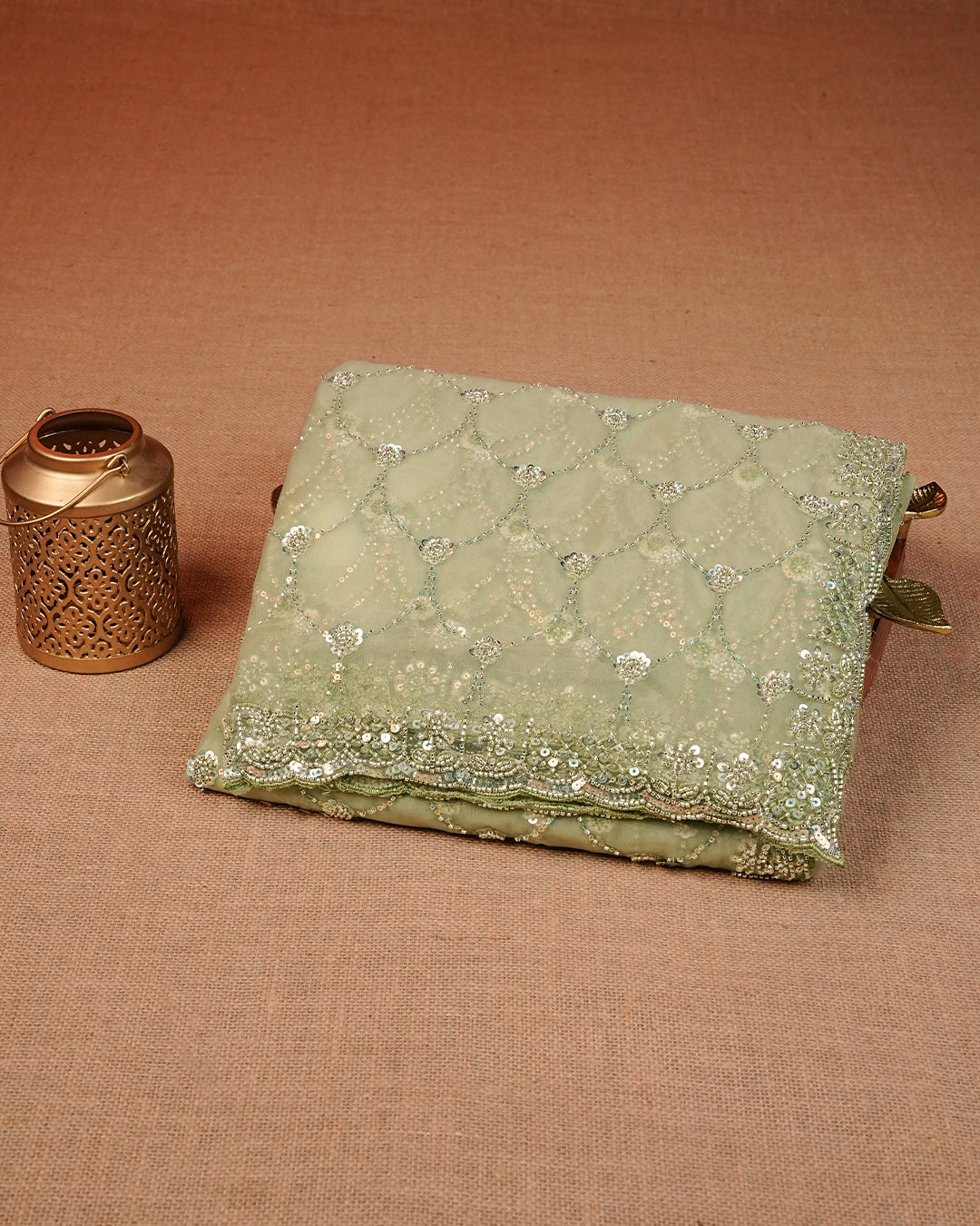 Mint colour Net Designer saree featuring Beats & Sequins geometric Pattern on body & worked border, comes with matching blouse piece.