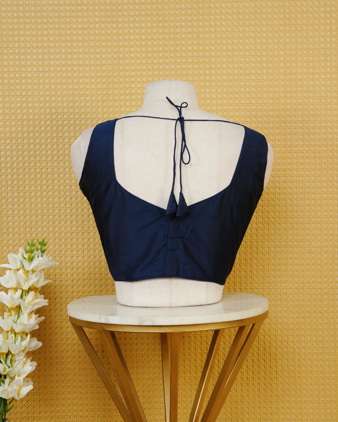 Blue colour Sleeveless Blouse Featuring A Stylish Sweetheart Neck, Smooth Finish, And A Comfortable Tailored Fit.
