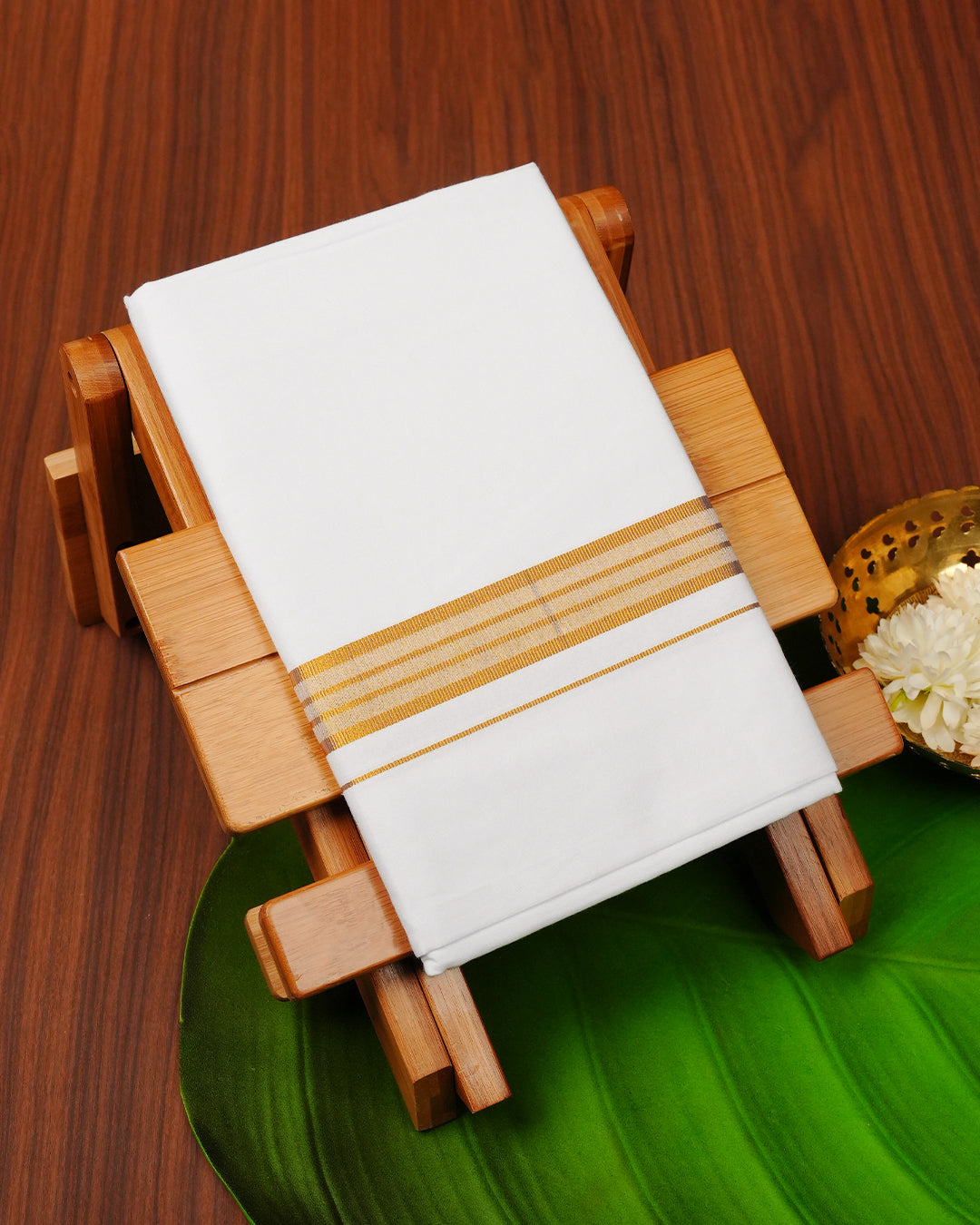 White colour cotton single dhoti featuring gold Kasav border.
