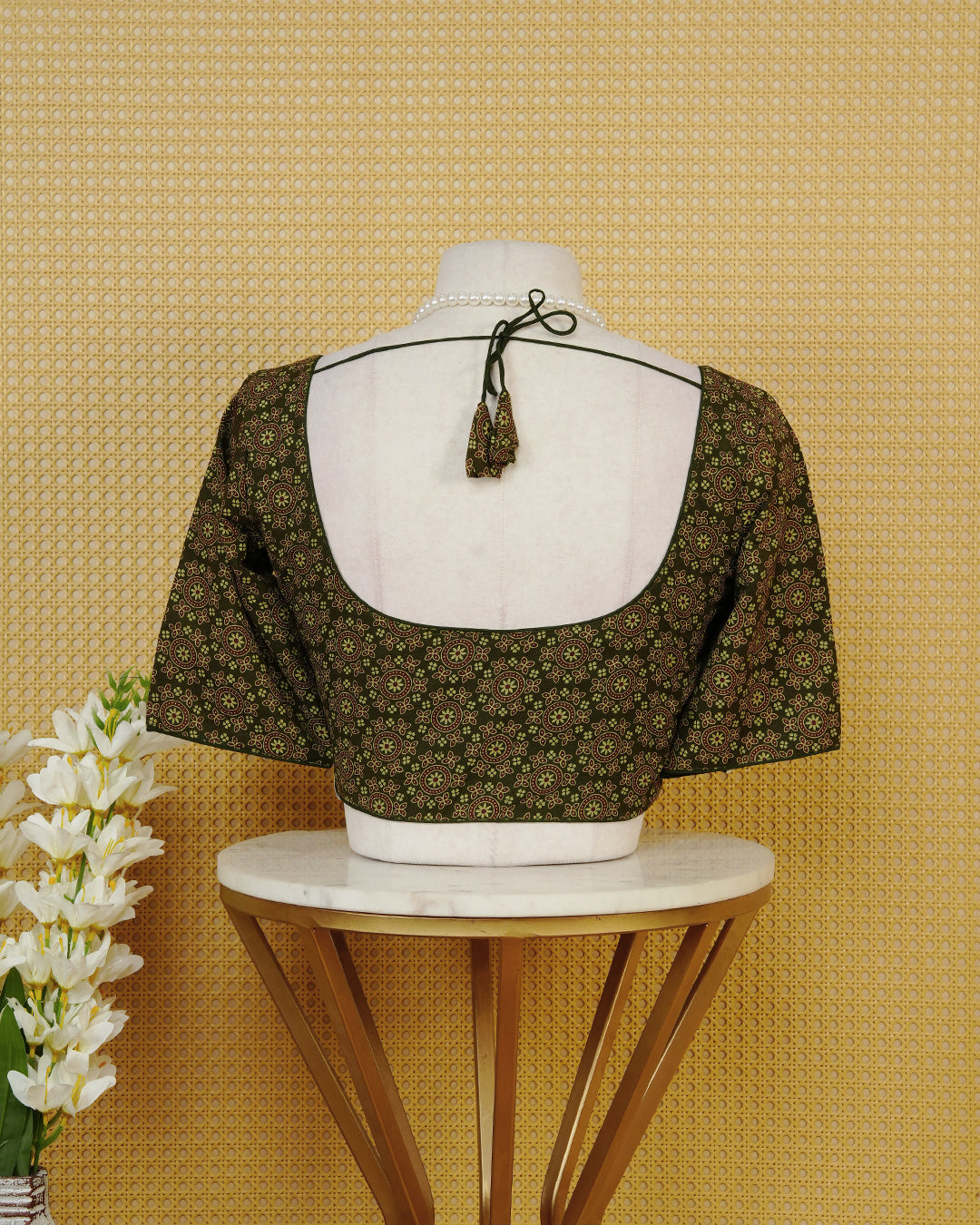 Olive Colour Blouse Featuring A Classic U-Neck, Intricate Floral Geometric Print, And Comfortable Elbow Length Sleeves.