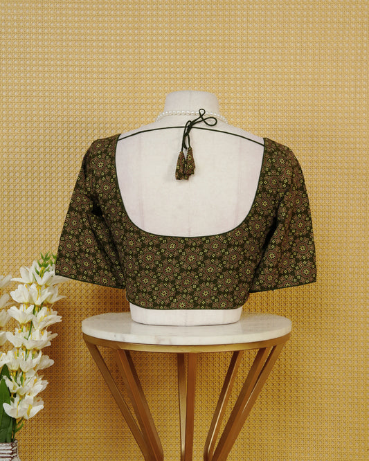 Olive Colour Blouse Featuring A Classic U-Neck, Intricate Floral Geometric Print, And Comfortable Elbow Length Sleeves.