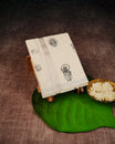 Cream Coloured Cotton Double Dhoti Finished with Onam Themed Prints & Rose Gold Kara