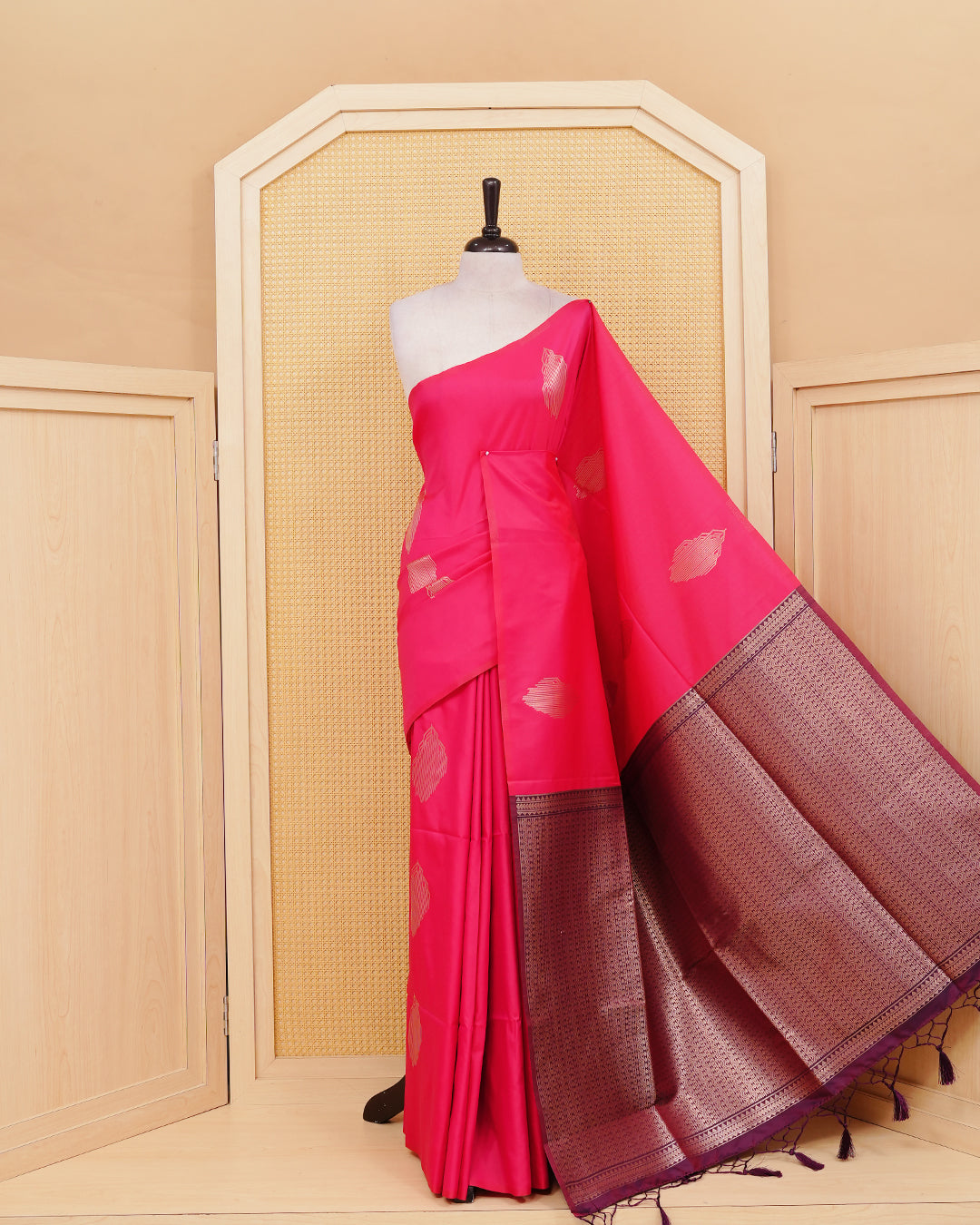 Rani Pink colour semi silk saree.