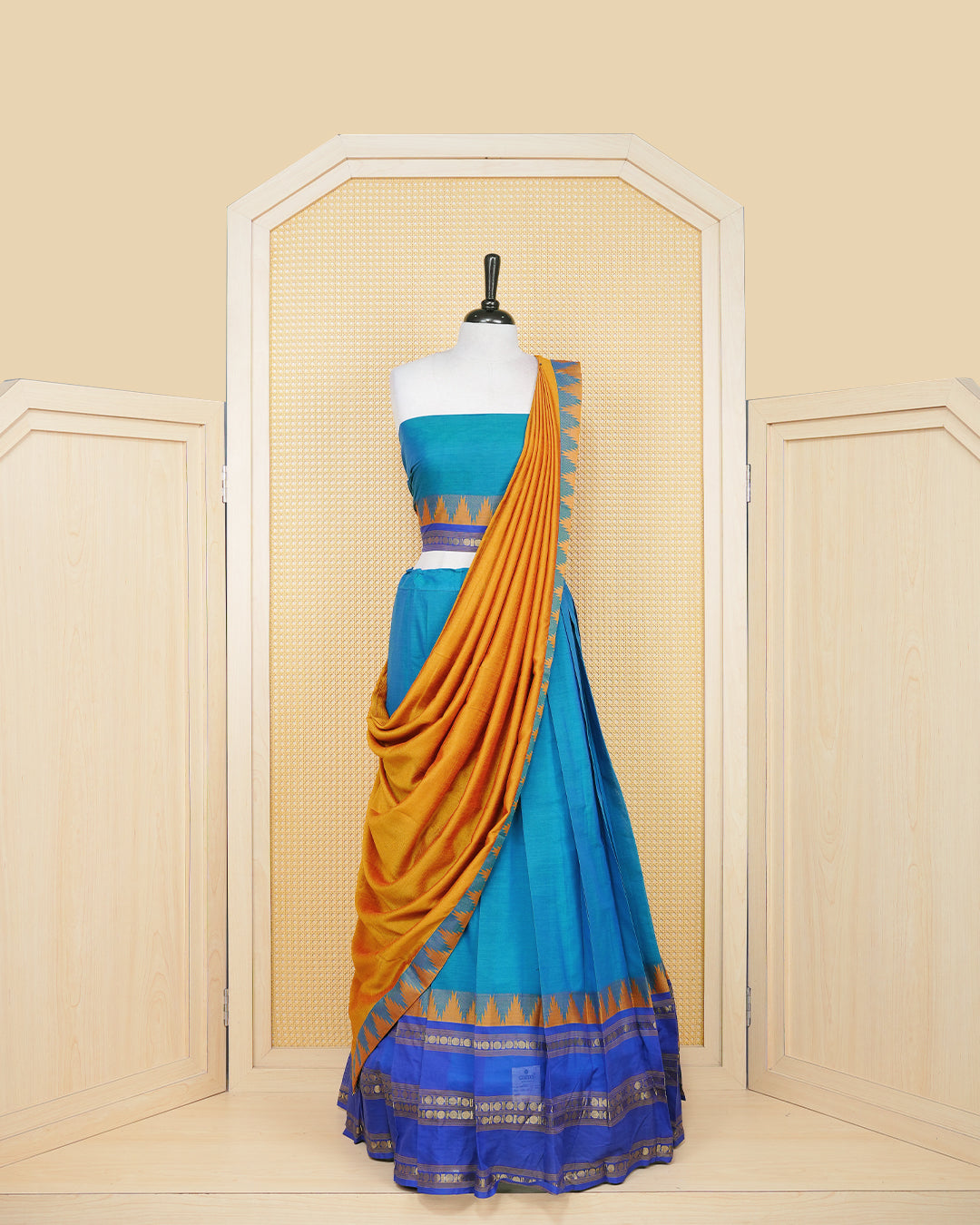 Peacock blue colour Chettinad Semi Stitched dhavani set Featuring blue with Gold zari on skirt, matching Blouse & Contrast dupatta.