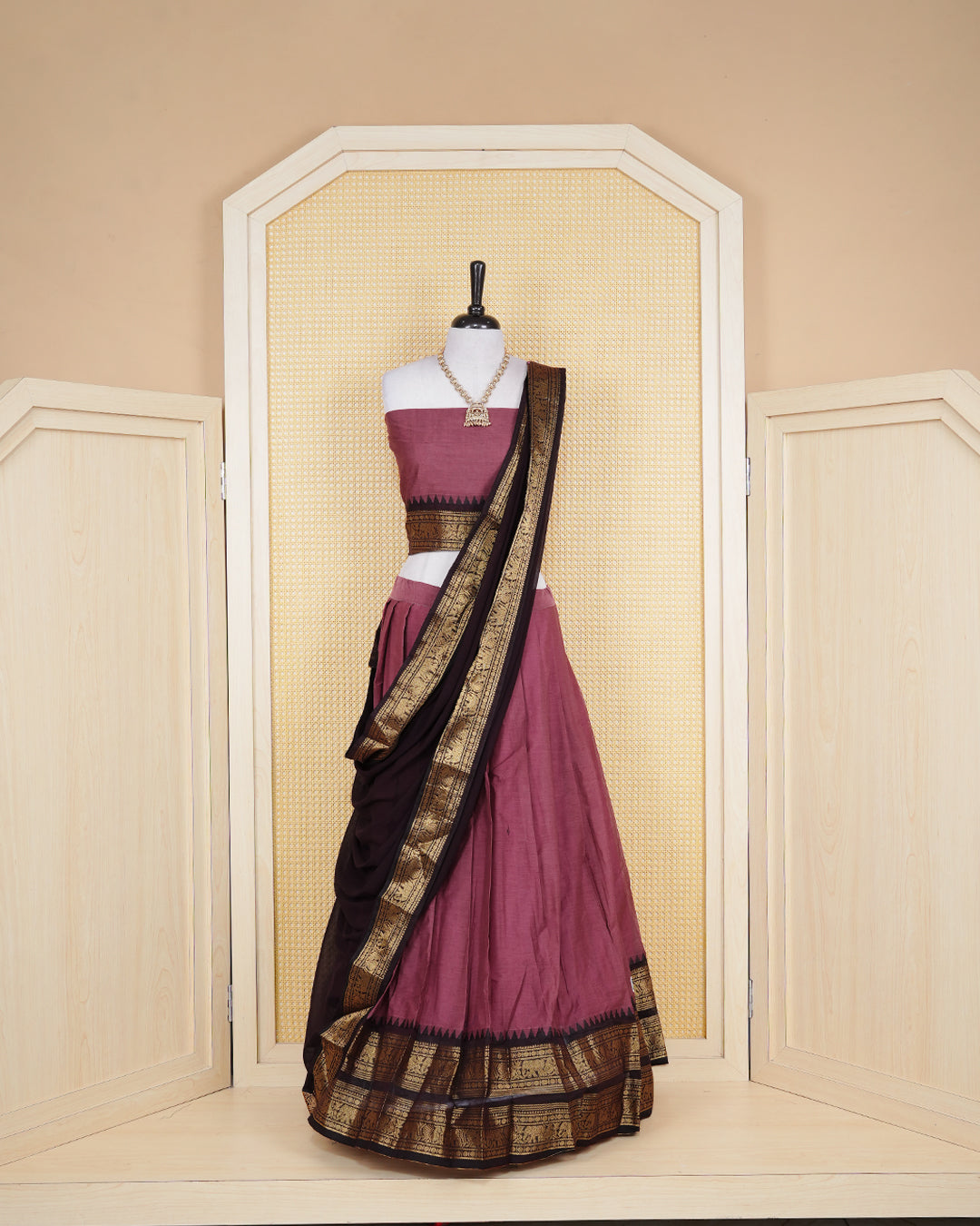 Dark Mauve Brown colour Chettinad Semi Stitched dhavani set Featuring contrast Dark Brown with Gold zari border on skirt, Contrast Blouse piece & matching dupatta.