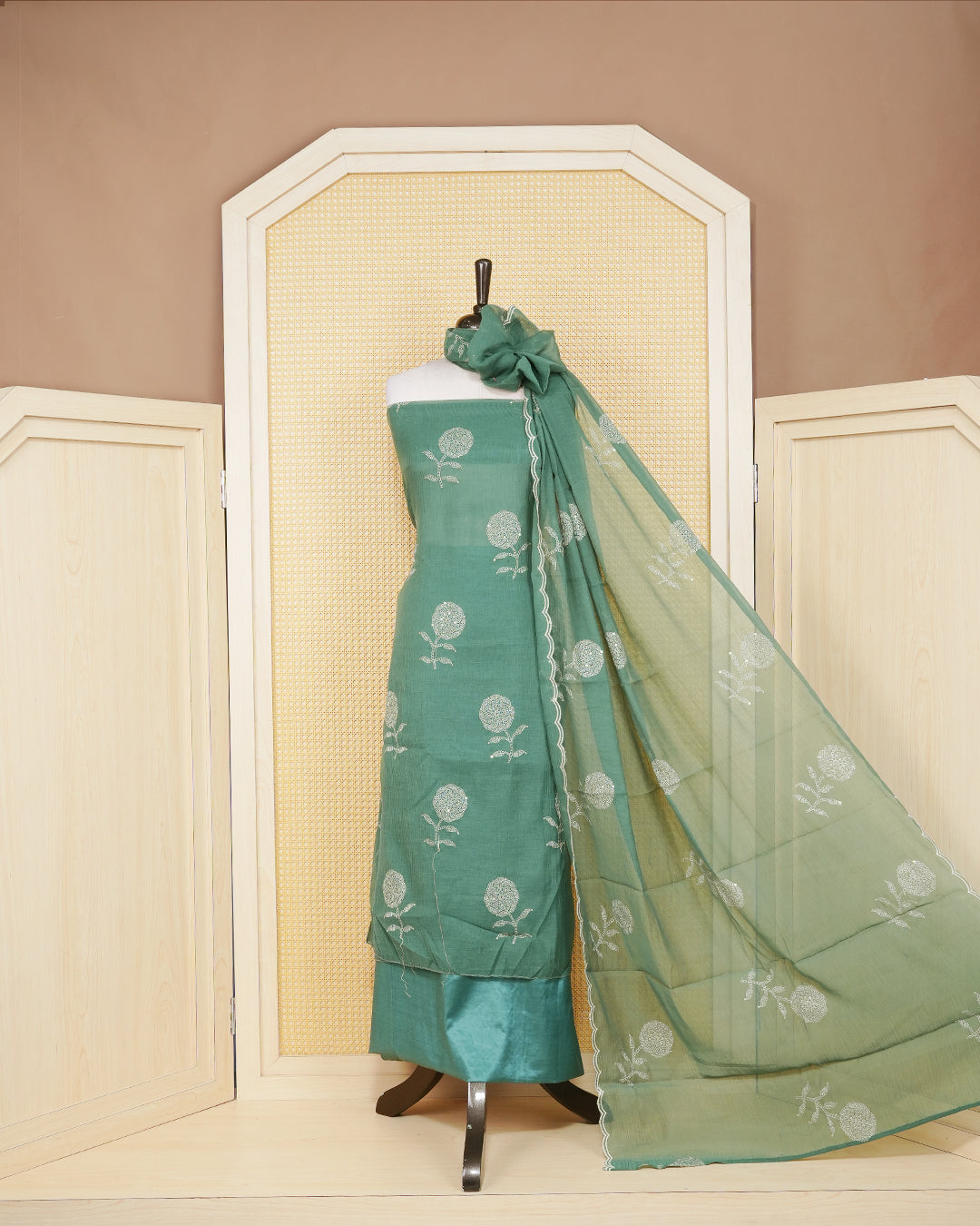 Dream Green colour Organza salwar material featuring Thraed Work without border, paired with matching bottom and elegant dupatta.