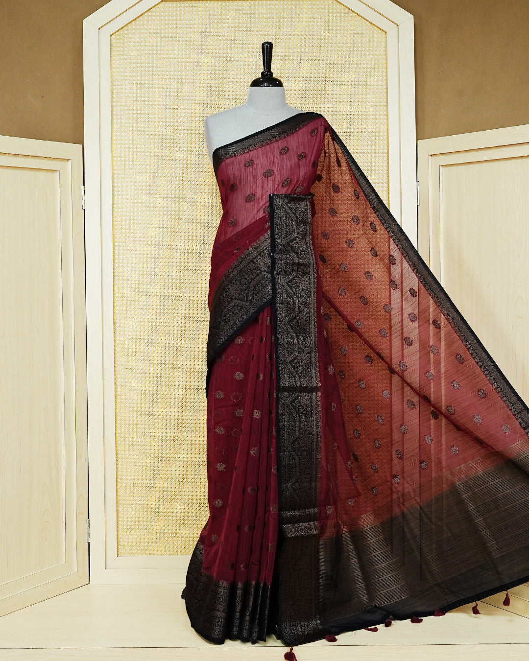 Maroon colour semi linen saree thread motifs on body, contrast dark colour gold zari border, rich pallu comes with matching blouse piece