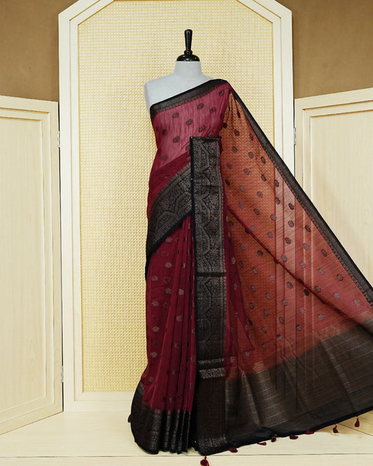Maroon colour semi linen saree thread motifs on body, contrast dark colour gold zari border, rich pallu comes with matching blouse piece