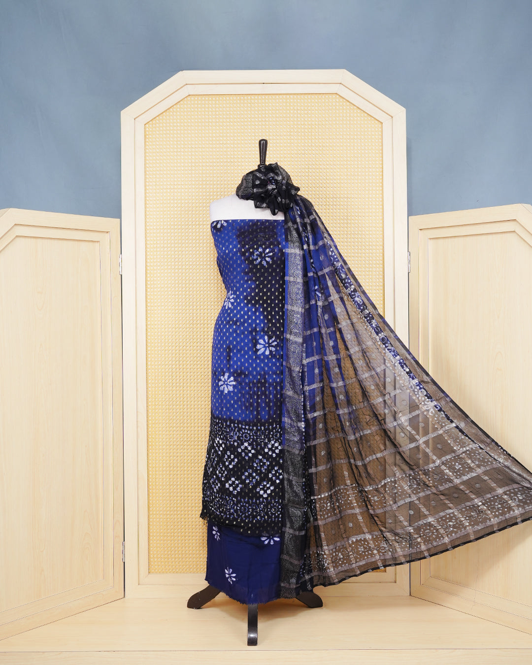 Navy Blue Georgette Salwar material Features a Vibrent Tie Dye Pattern Aborned With Shimmering Metallic Gold foil Dots,pired with matching bottom & elegant Duptta